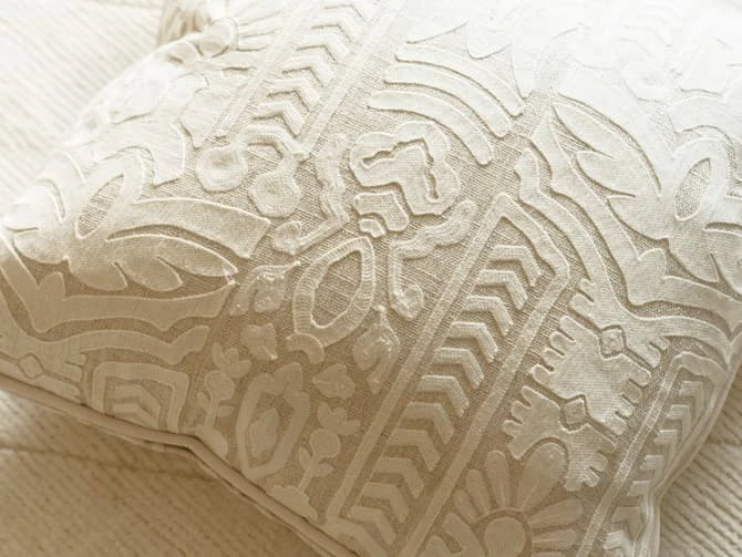 Embroidered cushion in totem linen in ivory Embroidered Cushion In Totem Linen In Ivory -Andrew Martin Store 128317 totem ivory cushion lifestyle 2 sml