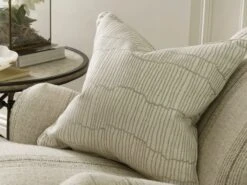 A Glamorous Geometric Cushion In String -Andrew Martin Store 141741 canale string cushion cable ecru piping sml