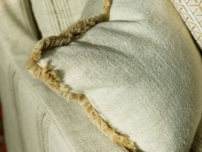 Two-tone herringbone cushion in ecru Two-tone Herringbone Cushion In Ecru -Andrew Martin Store 151867 sanremo ecru reverse cushion detail sml