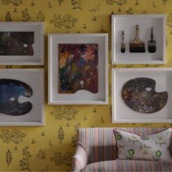 Wychwood Provencal Yellow Wallpaper -Andrew Martin Store 216452 wychwood provencal yellow wallpaper with leto sofa upholstered in talitha cocktail fabric and scatter cushion in psycho sprig tropical yellow fabric