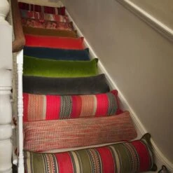 Medici Charcoal Draught Excluder Cushion -Andrew Martin Store 352990 draught excluder stair group shot sml